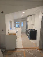 White cabinetry installation in progress during a Denver kitchen remodel